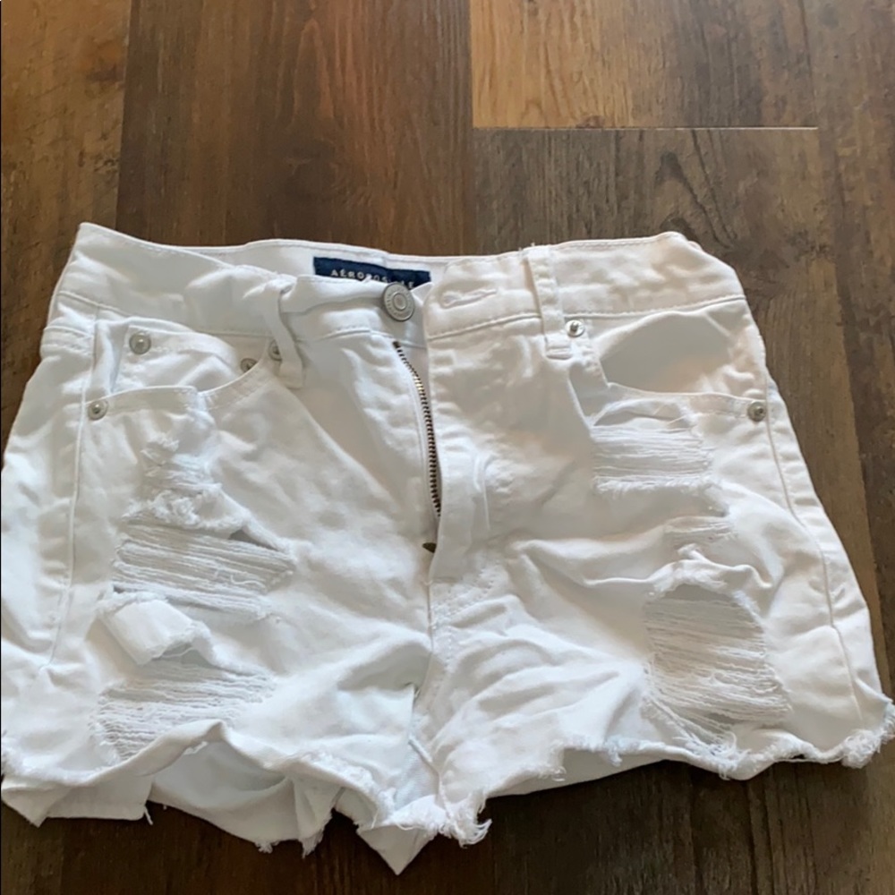 white ripped jeans shorts